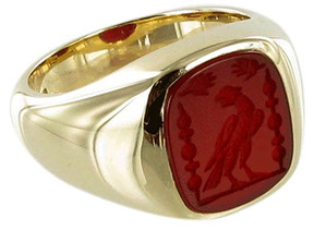 Example of a cushion shaped cornelian ring, seal engraved with a family crest.