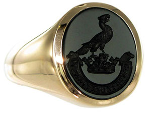 Example of a jet black Onyx signet ring. Seal engraved with a crest and motto.