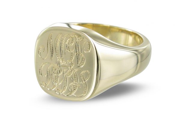 Wedding signet ring with two monograms sealed in matrimony