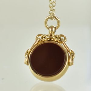 Antique 1901 18 carat Yellow Gold Swivel Seal Pendant